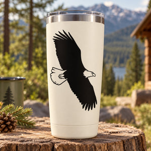Black eagle silhouette floating decal on a white tumbler
