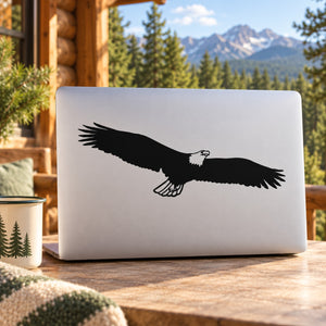 Eagle in-flight vinyl decal, black bird graphic on white laptop lid