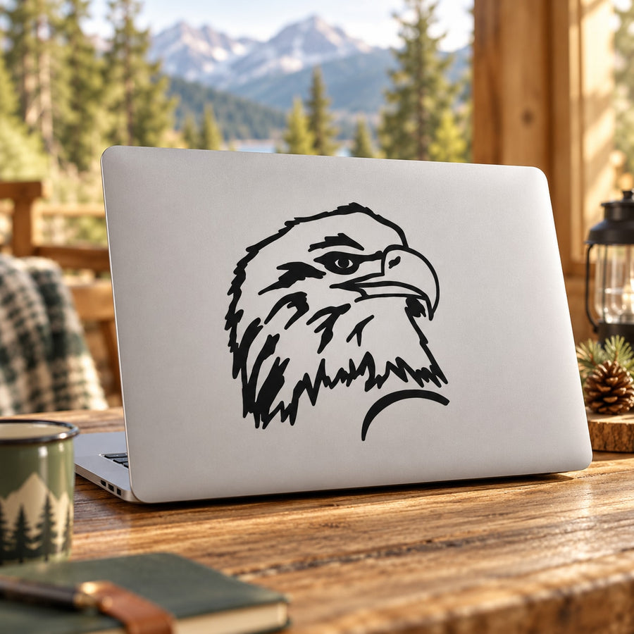 Eagle head decal sticker with bold black outline on light surface