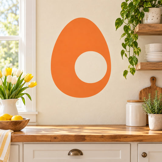 Orange egg-shaped wall decal with white yolk circle