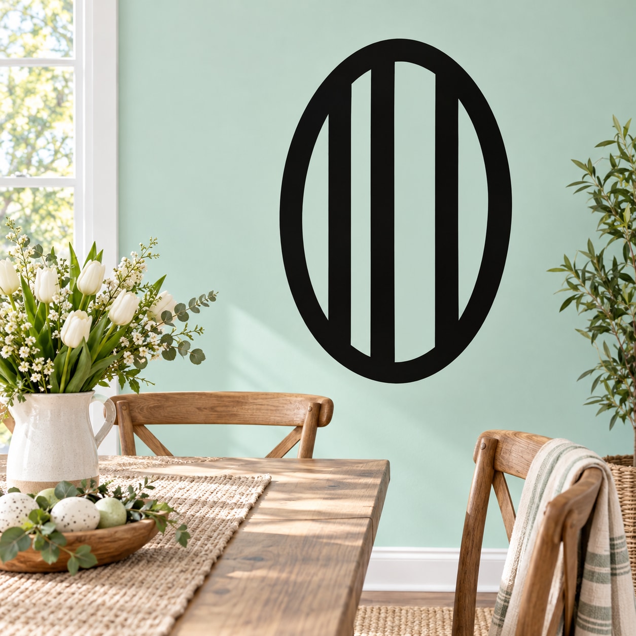 Black egg-shaped decal with vertical stripe stripes inside the outline