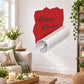Heart-shaped Happy Easter illusion tear sticker, red with black text and white tear opening