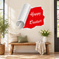Rolled red Happy Easter tear-off sticker with white script text