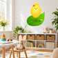 Yellow Easter chick sticker perched on a green leaf