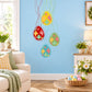 Easter egg wall decal with spring vines, five colorful printed eggs with dotted outlines