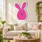 Pink bunny face sticker with white border, rounded ears and small nose detail.
