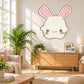 Fluffy Easter bunny face sticker with pink ears and whiskers