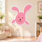 Smiling pink Easter bunny face sticker with white border, smiling nose and eyes