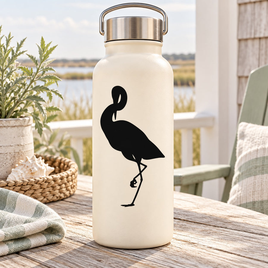 Black egret silhouette grooming decal on a light surface