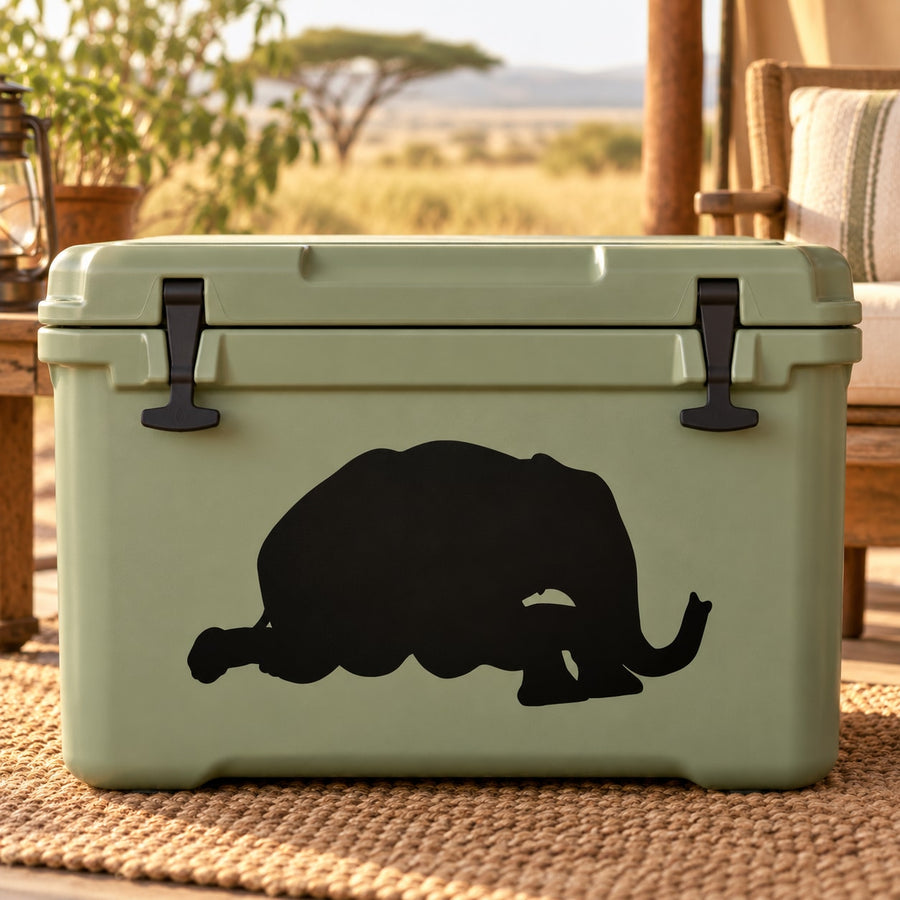 Resting elephant decal sticker with black silhouette on a light green surface