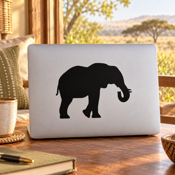Black elephant silhouette decal on white laptop