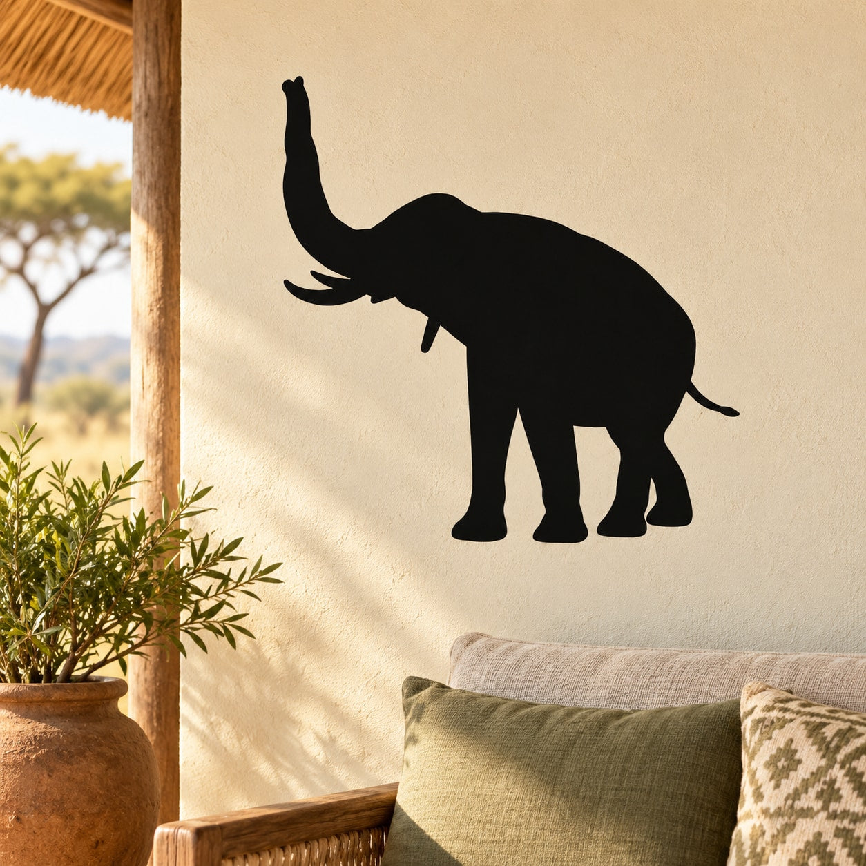 Black elephant trunk decal silhouette on wall