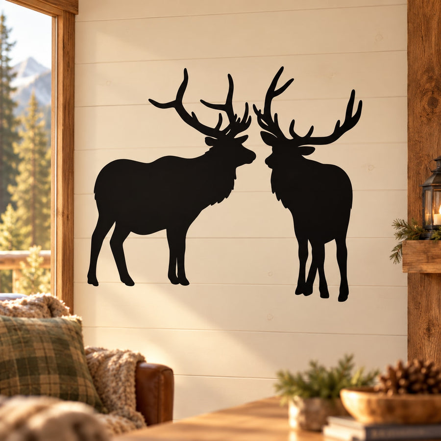 Two black bull elk fighting decal with antler silhouettes