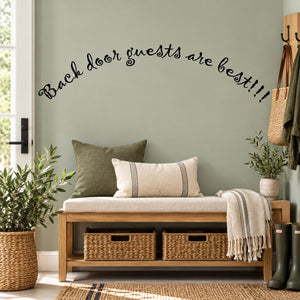 Wall decal reading 'Back door guests are best!!!' in black cursive script.