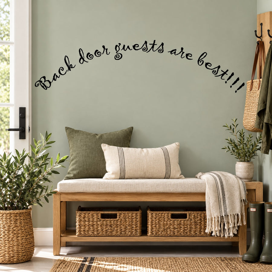 Wall decal reading 'Back door guests are best!!!' in black cursive script.