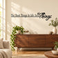 Wall decal with quote text and large script word "Things" in black