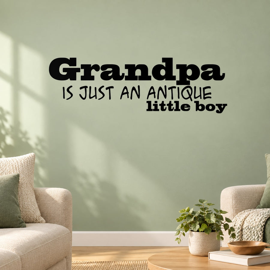 Wall decal text: "Grandpa is just an antique little boy" (black).