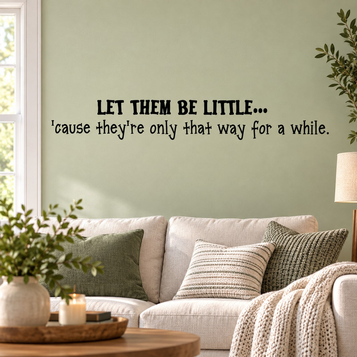 Wall decal text 'Let them be little...' with small leaf vine
