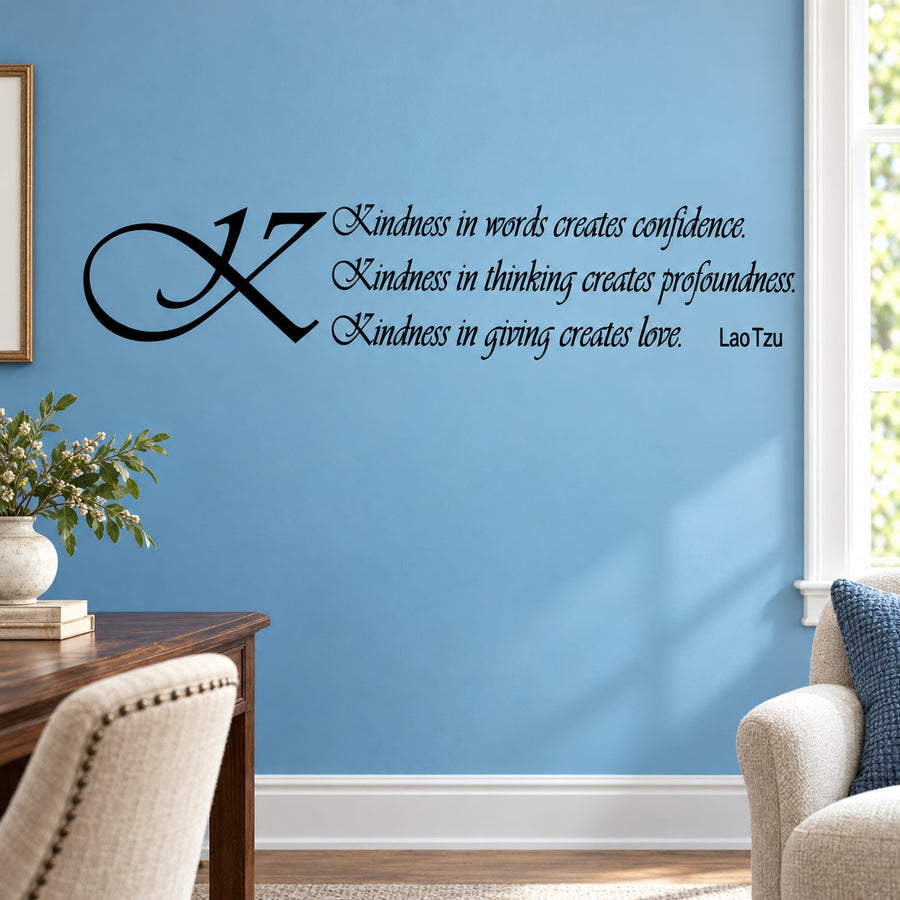 Black wall quote decal with cursive text and decorative X, featuring Lao Tzu