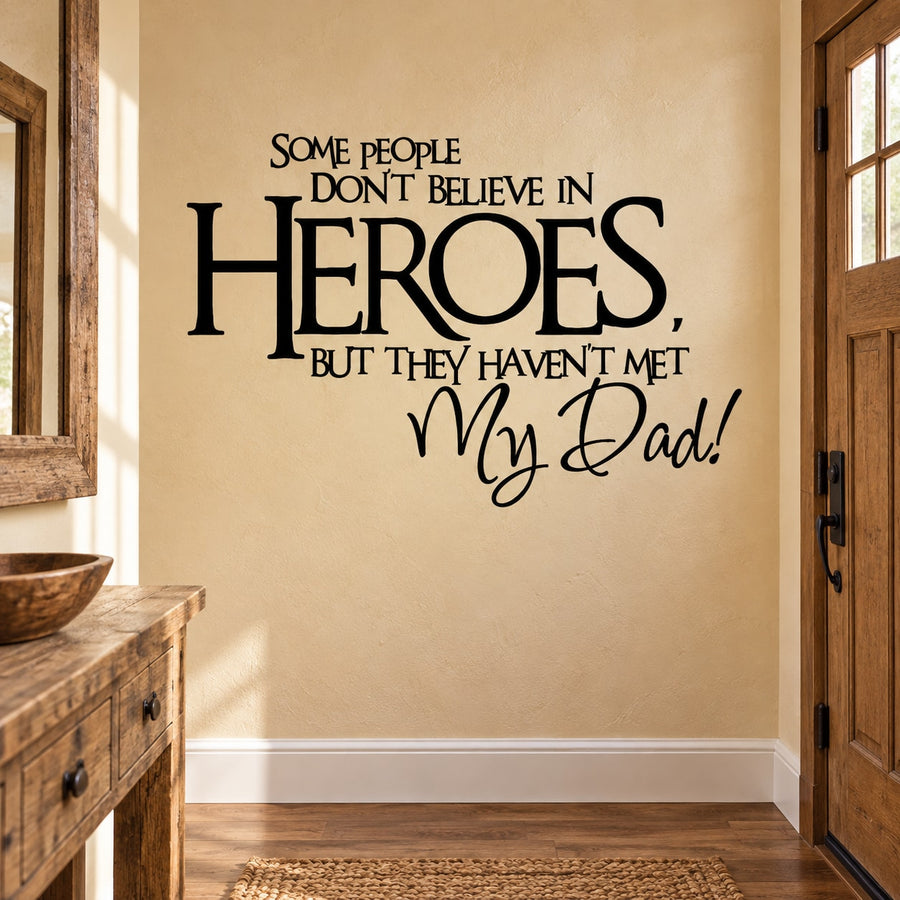 Wall decal with black typography quote: “Don't Believe in Heroes? My Dad!”