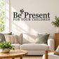 Wall decal featuring "Be Present for Your Children" black typography