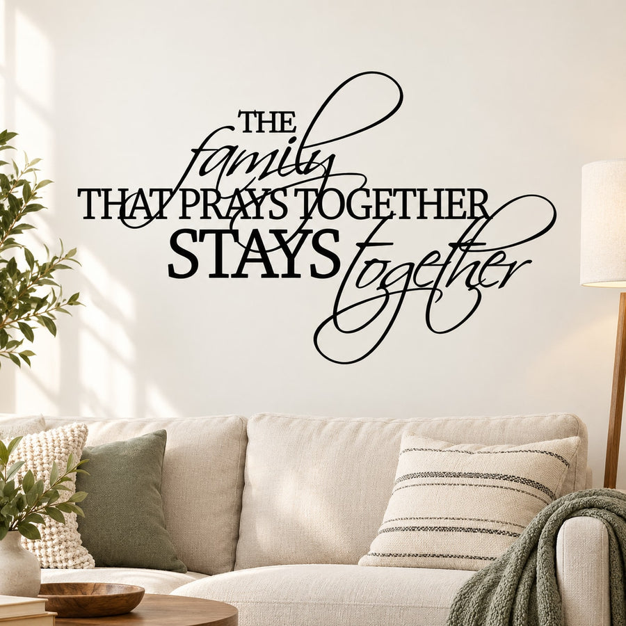 Wall decal with script quote: The Family That Prays Together Stays Together