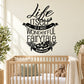 Black wall decal text: “Life is a wonderful Fairytale” with decorative leaves