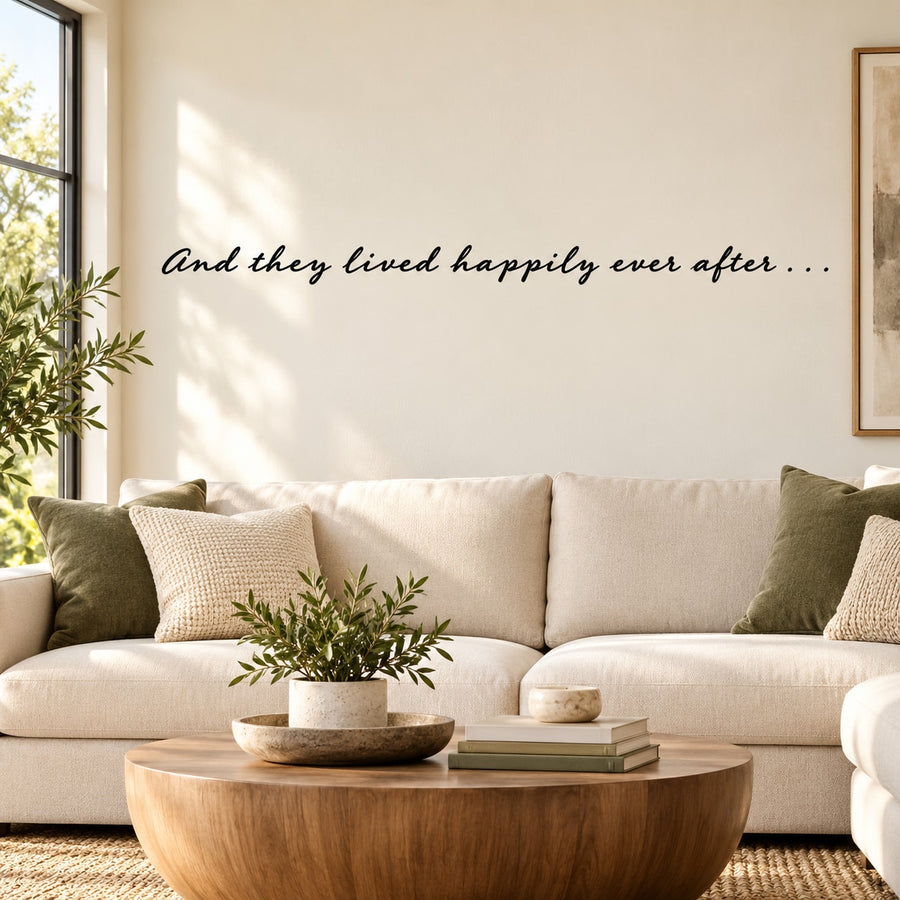 Cursive wall decal with "And they lived happily ever after…" text on beige wall
