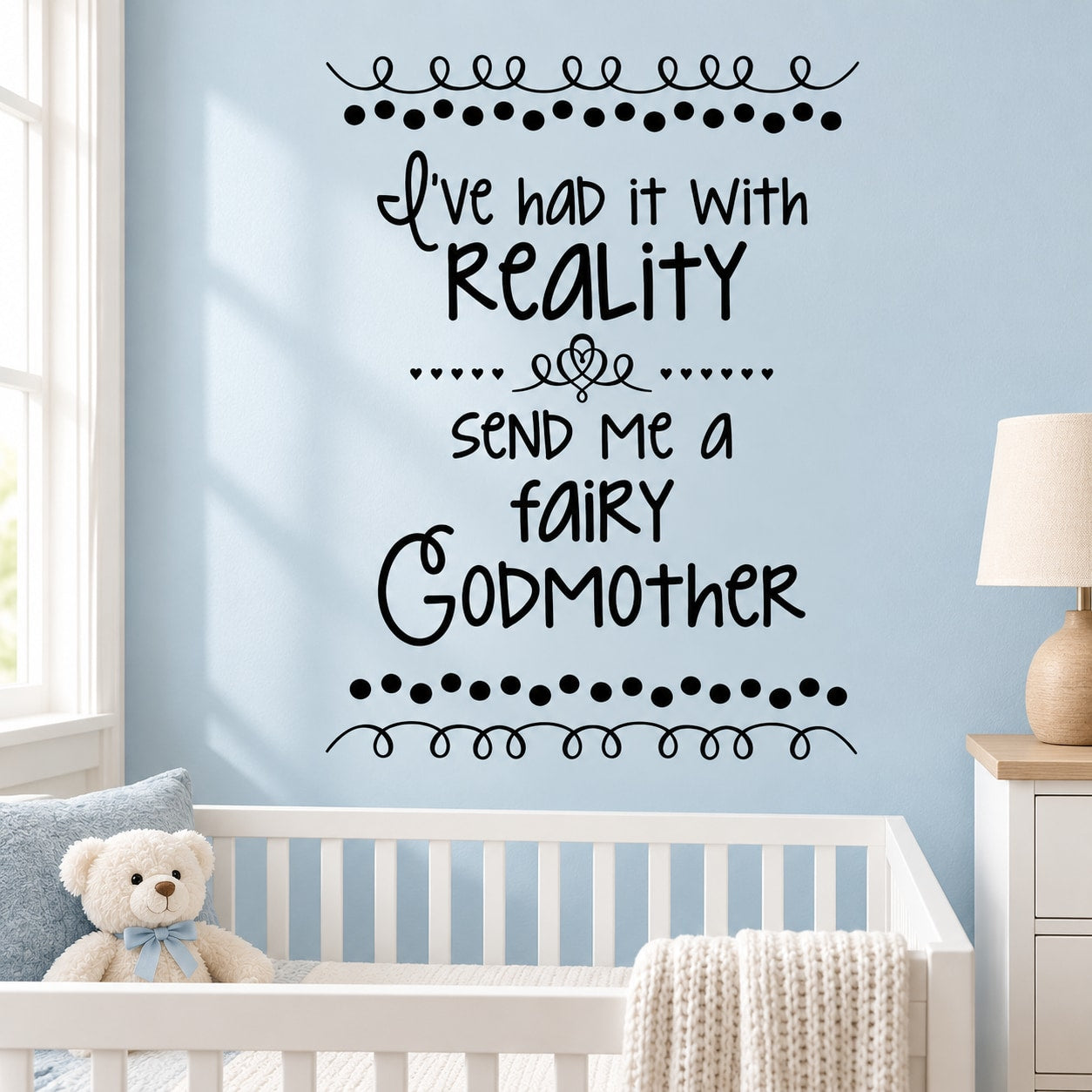 Black quote wall decal with hearts and dotted border reading 'Reality, send me a fairy Godmother'