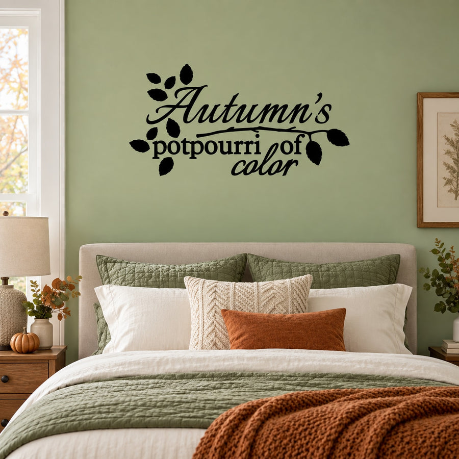 Black text wall decal reading "Autumn's potpourri of color"