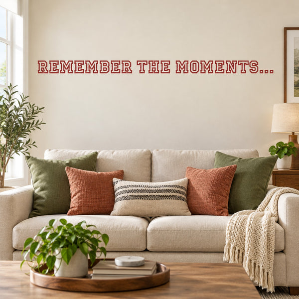 Wall decal with red text: 'REMEMBER THE MOMENTS...'
