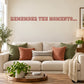 Wall decal with red text: 'REMEMBER THE MOMENTS...'