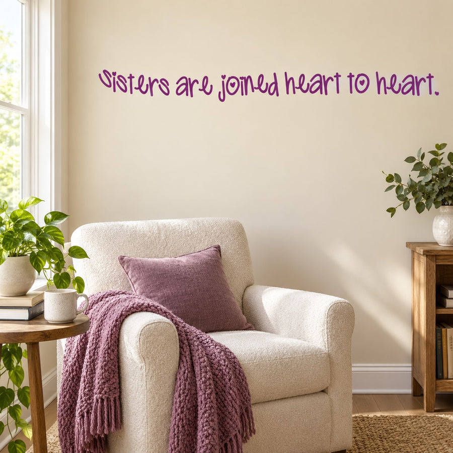 Sisters are joined heart to heart Wall Decal — illustrative vinyl decal application mockup. Surrounding objects are not included.