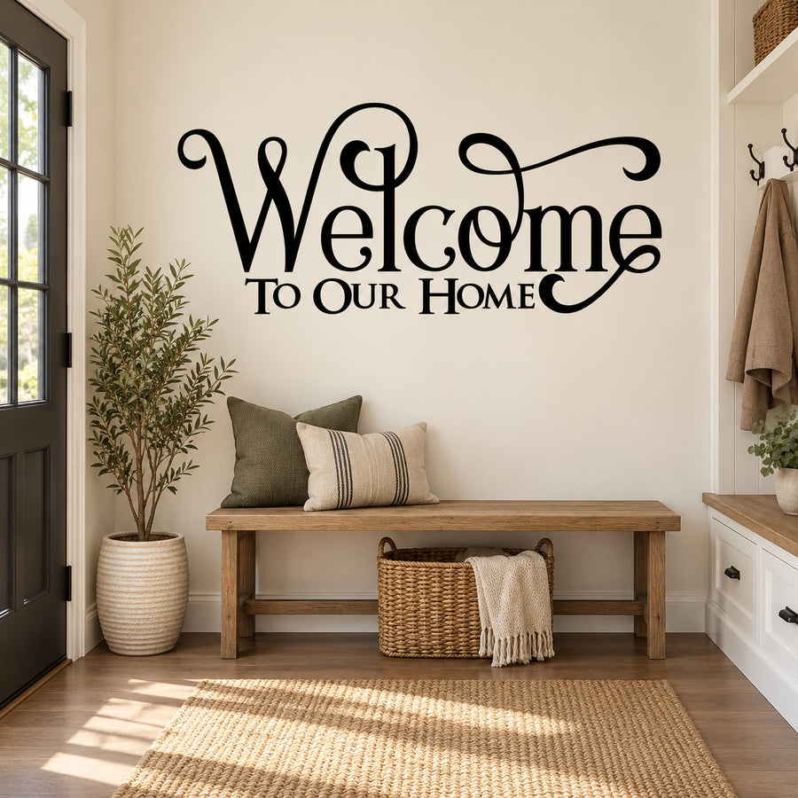 Black cursive wall decal reading 'Welcome' and 'To Our Home'.