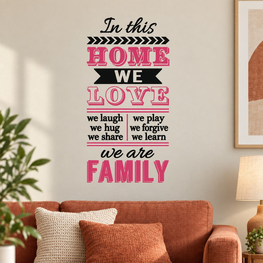 In This Home We Love We are a Family Printed Die Cut Decal — illustrative vinyl decal application mockup. Surrounding objects are not included.