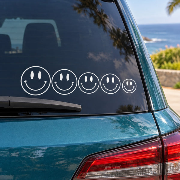 Car window smiley face family kit decals with five white-outlined faces