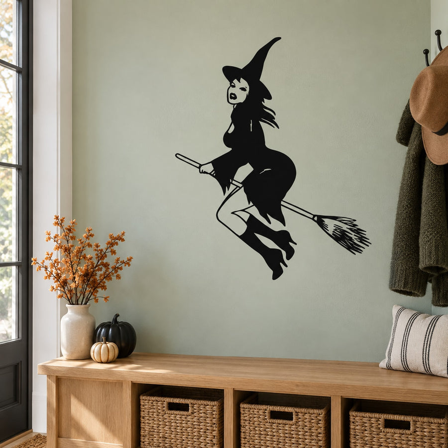 Black flying witch wall decal silhouette holding broom
