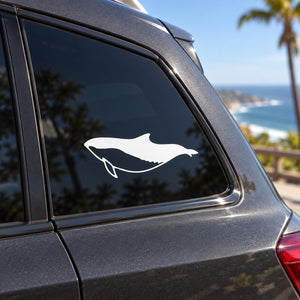 White dolphin swimming decal on car window