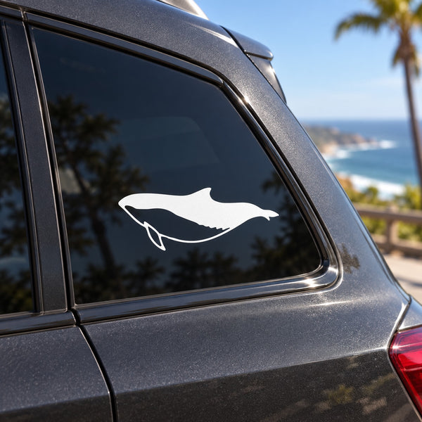 White dolphin swimming decal on car window