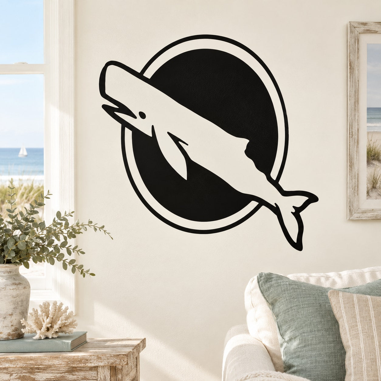 Black whale silhouette decal inside a white-outlined circle
