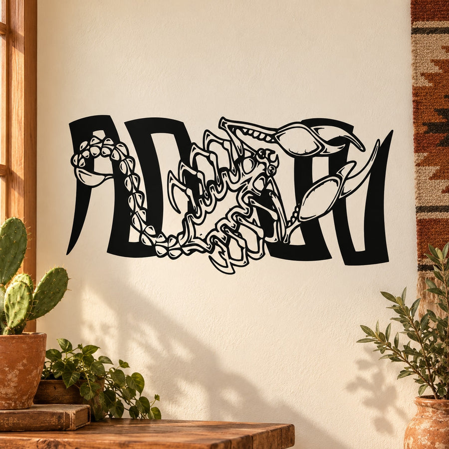 Scorpion wall decal with black-and-white zigzag lettering and raised claw design