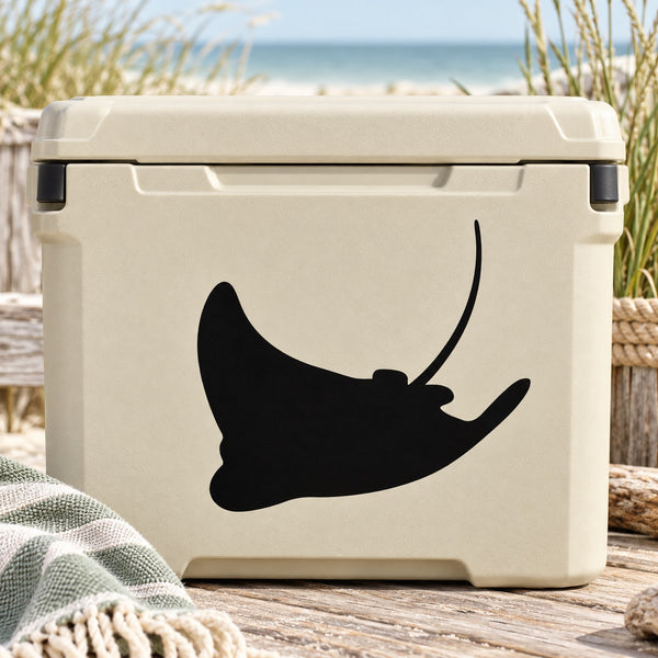 Swimming stingray decal with black silhouette on beige surface