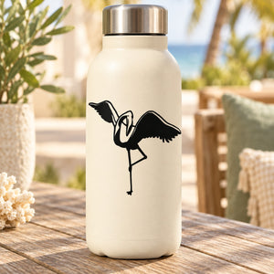 White bottle with black flamingo grooming decal