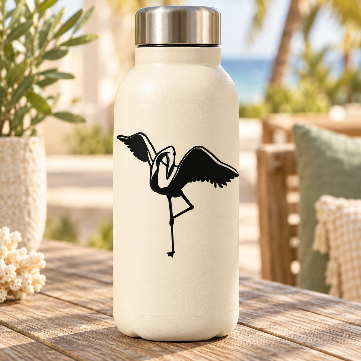 White bottle with black flamingo grooming decal