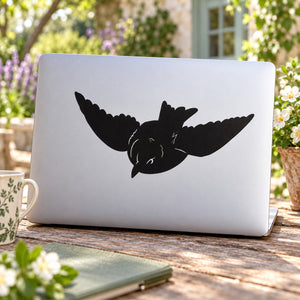 Black flying bird vinyl decal with open wings and small tail