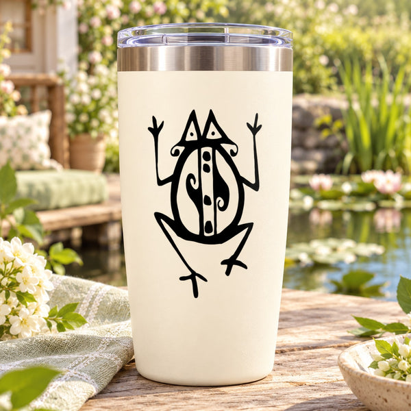 White tumbler with black tribal frog decal