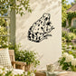Spotted sitting frog decal with black outline and dark spots on light background