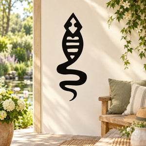 Black abstract tadpole frog wall decal, teardrop silhouette on a light background