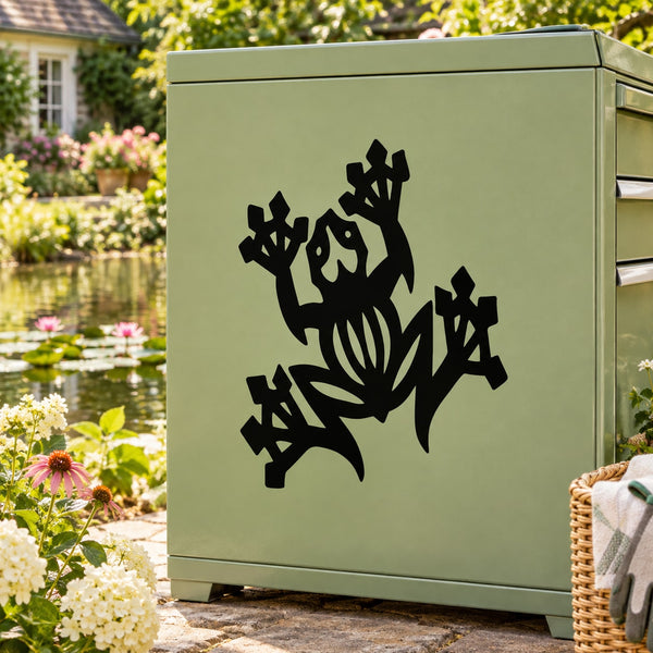Frog tattoo-style decal, black silhouette on a green surface