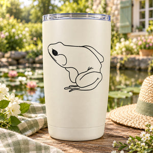 Squatting frog line-art decal on light tumbler, black outline